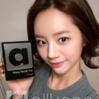 Girl's Day's Hyeri with her allkpop Awards trophy